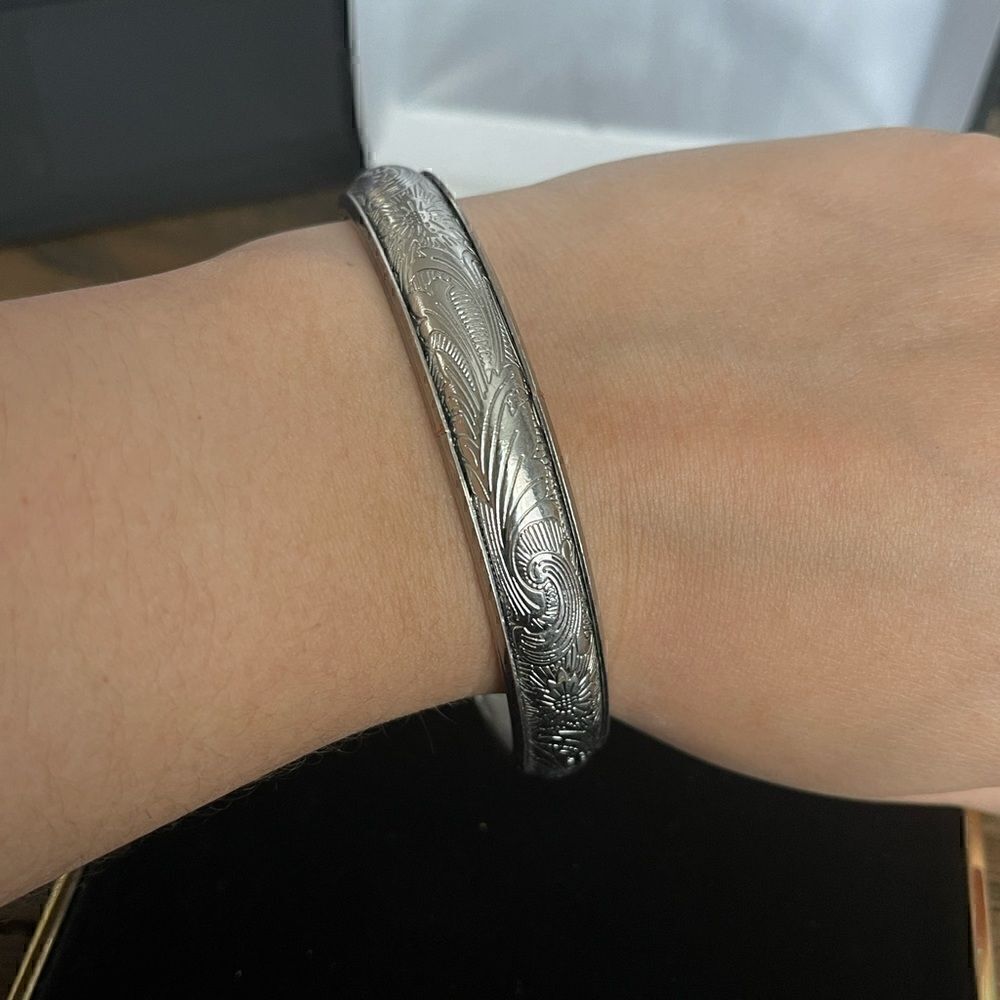 Silver tone bangle carved bracelet